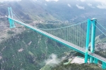Huajiang Grand Canyon Bridge videos, Huajiang Grand Canyon Bridge travel time, china cuts travel of 2 hours to 2 mins with highest bridge, Engineers