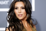 Kim Kardashian news, Kim Kardashian latest hot, kim kardashian sizzles in a wet swimsuit, Flat stomach
