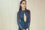 Nargis Fakhri hot in green, Nargis Fakhri navel show, nargis fakhri asked to pin up her dress, Uday chopra