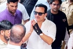 Saif Ali Khan breaking news, Saif Ali Khan fans, saif ali khan walks out of hospital after getting discharged, Kareena kapoor khan